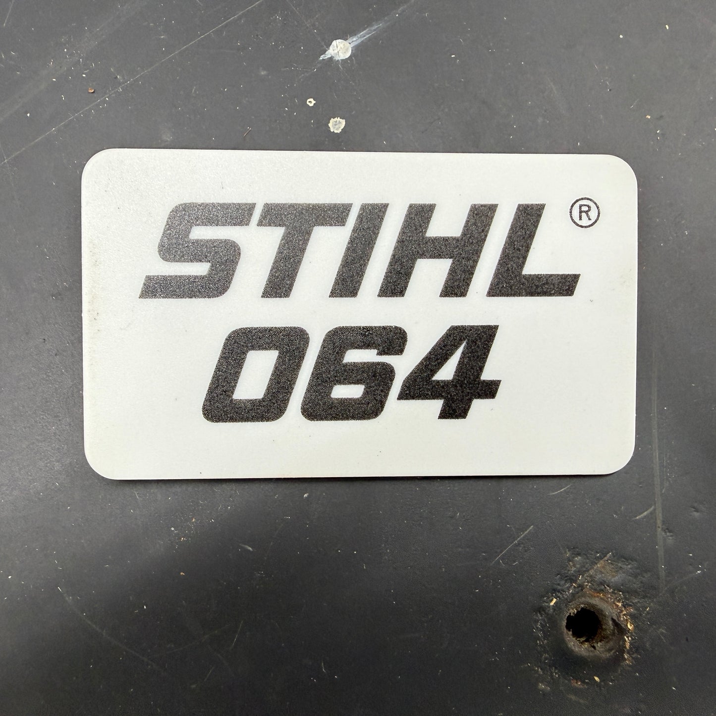 064 Stihl OEM Top Cover Badge