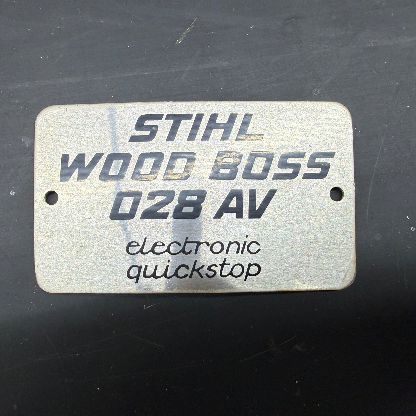 028 Wood Boss AV OEM Stihl Metal Top Cover Model Badge
